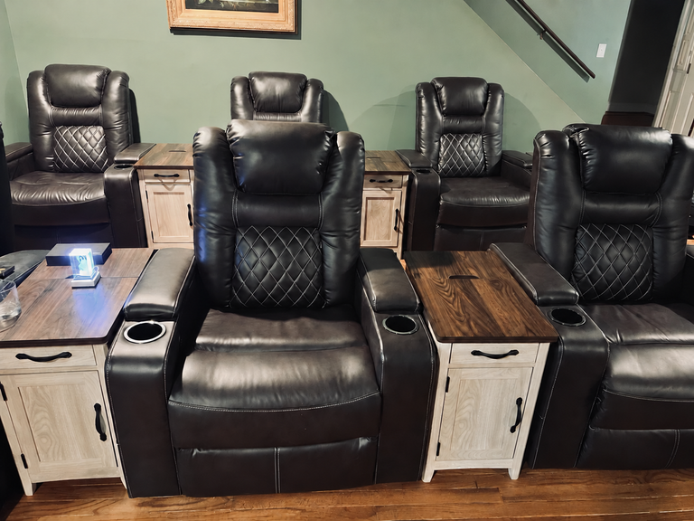 Brown power recliners paired with narrow charging end tables in our family room